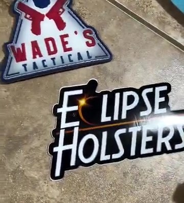 Wade's Tactical patch alongside an Eclipse Holsters patch